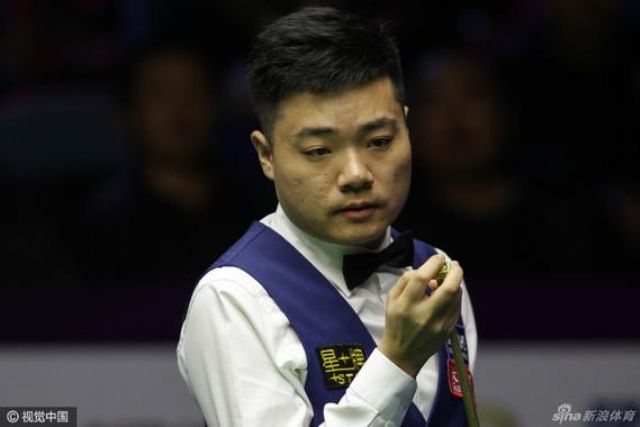 丁俊晖险胜沃顿